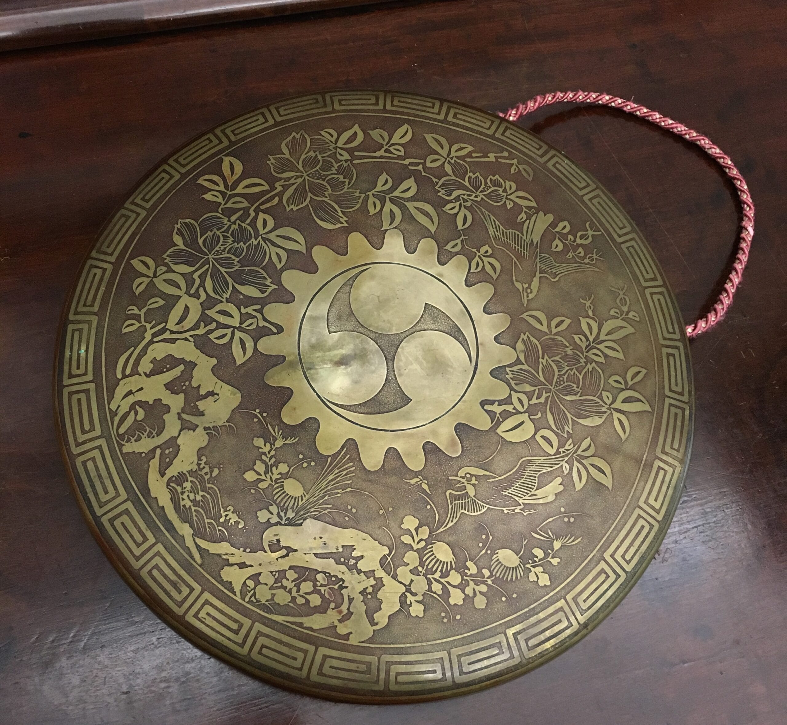 Oriental brass dinner gong decorated with birds and foliage, 19th Century -0