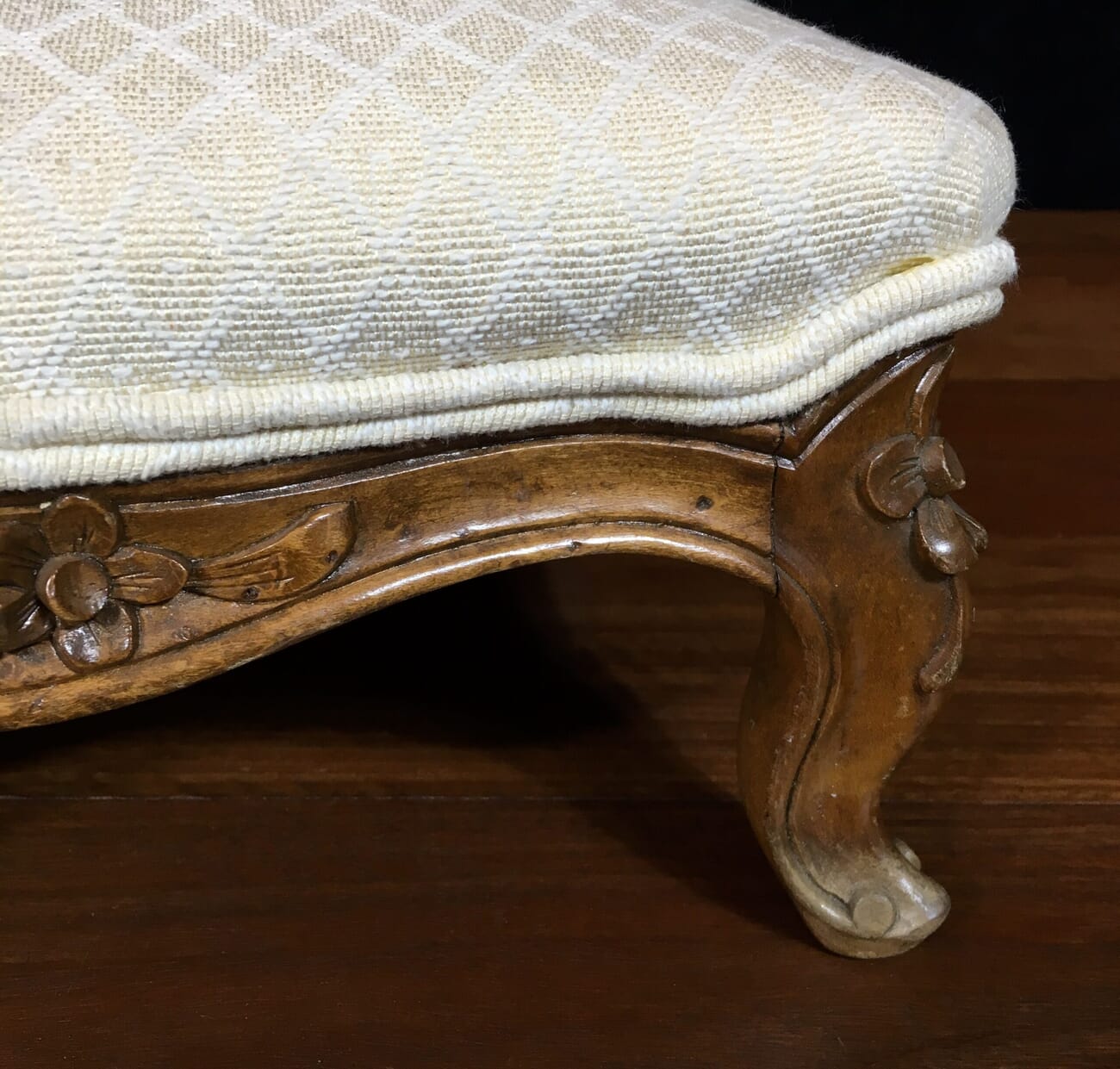 Small French stool with carved legs and cream upholstery. c. 1875 -18885