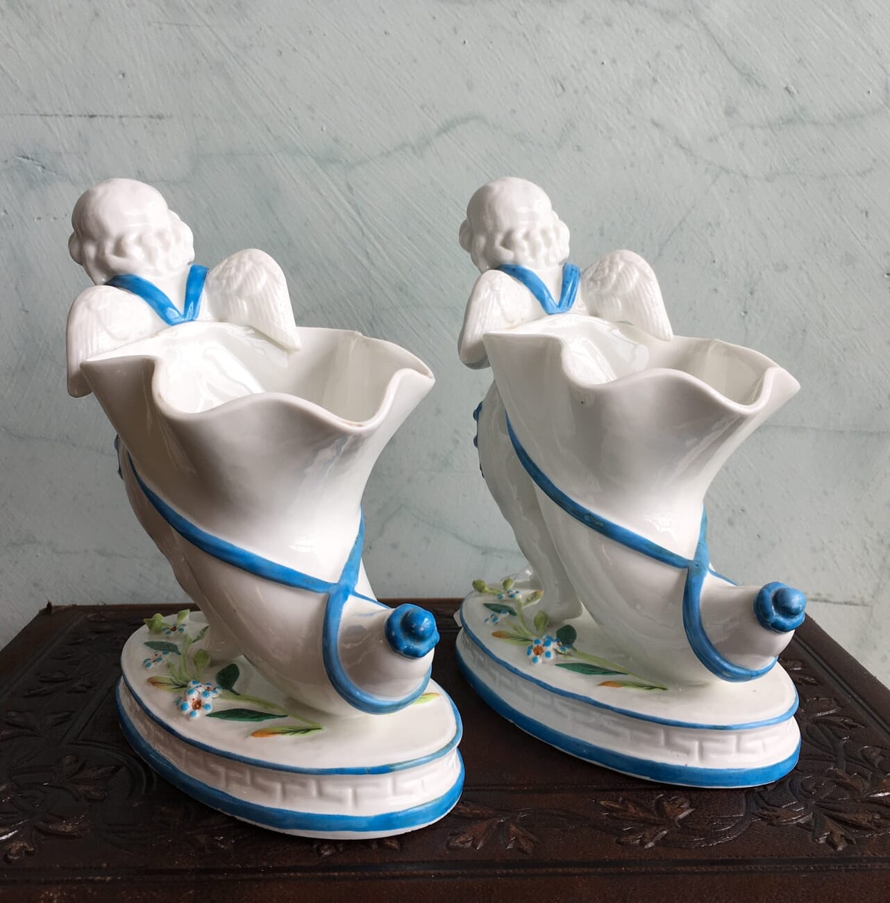 Pair of English porcelain cherub cornucopia vases, c.1875-18652