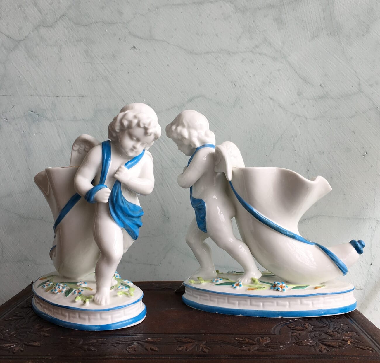 Pair of English porcelain cherub cornucopia vases, c.1875-18655