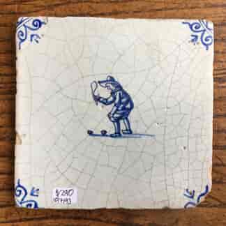 Dutch Delft tile, man playing a game, c. 1700 -0