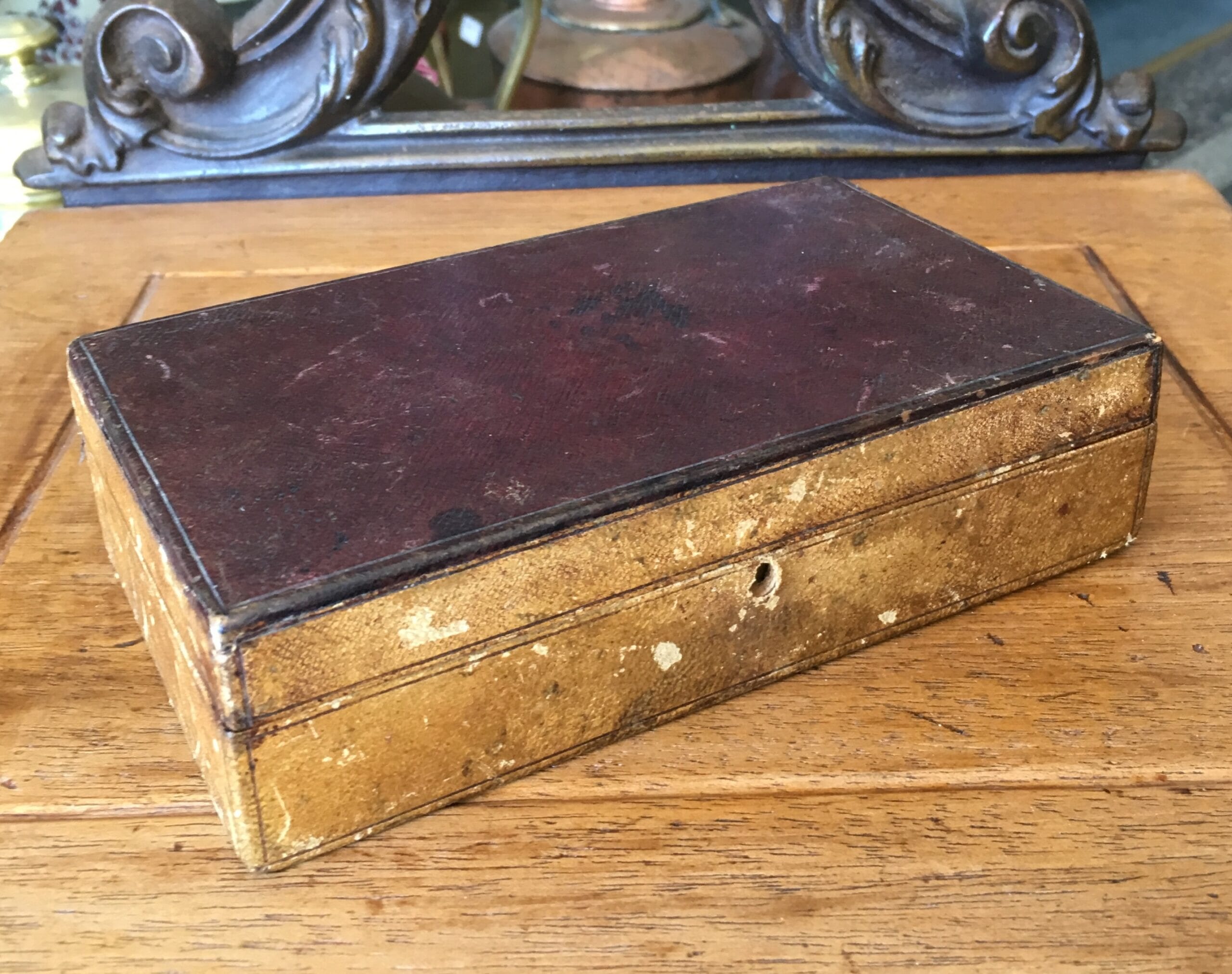 Small fitted leather bound box, mirror in lid, c. 1830-0