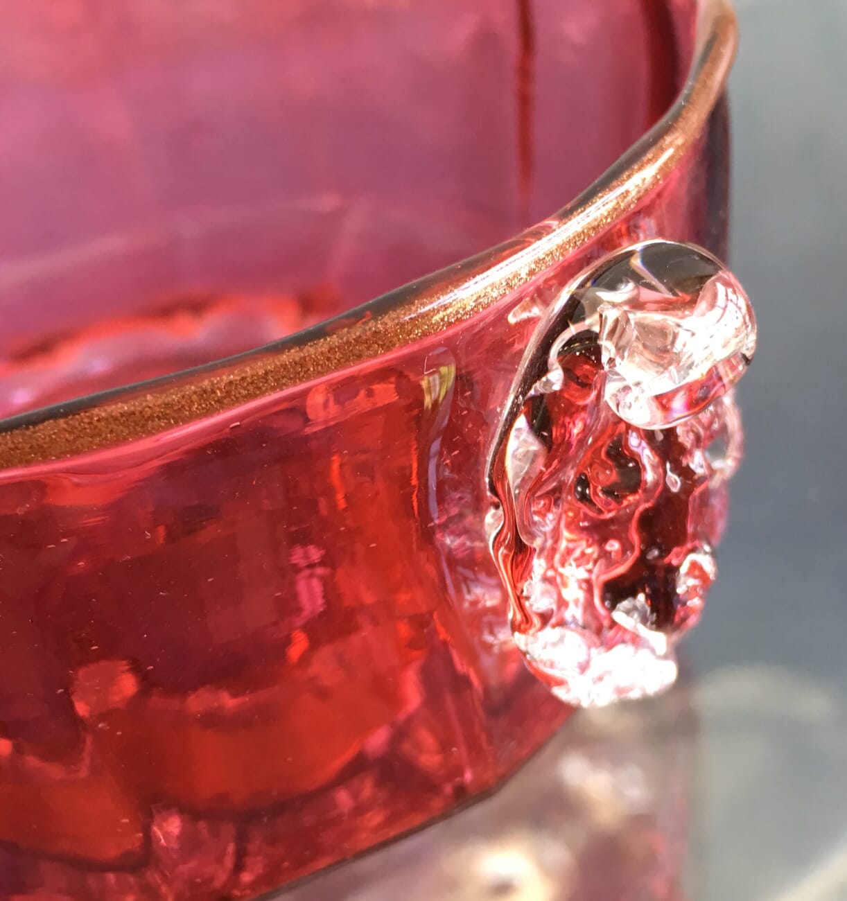 Victorian Ruby glass bowl, moulded faces, C.1880-20499