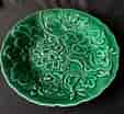 English green majolica plate moulded with Pelargoniums, 19th century -0