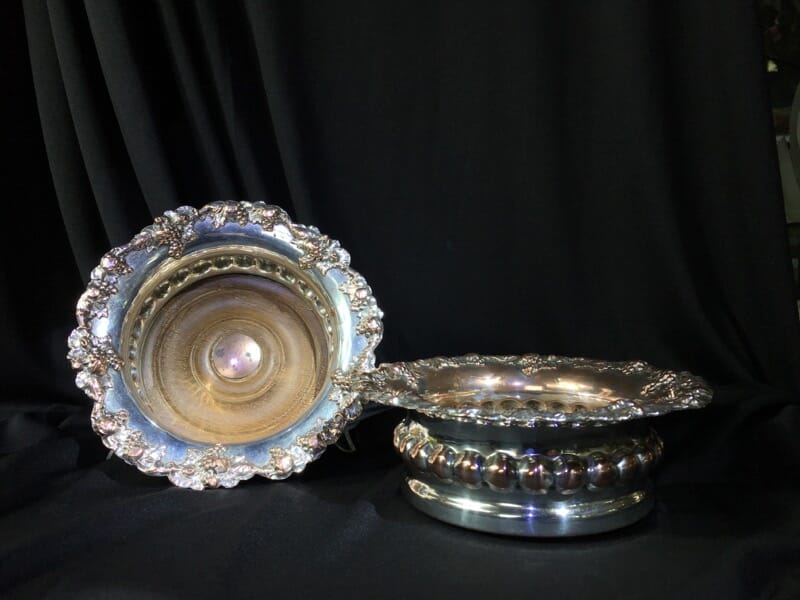 Old Sheffield Plate pair of Wine Coasters with fruiting vine rims, c. 1825-0