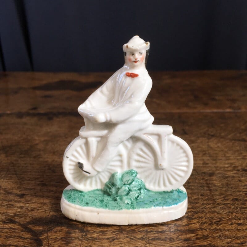 Staffordshire figure of a gentleman on bicycle, c. 1880 -0