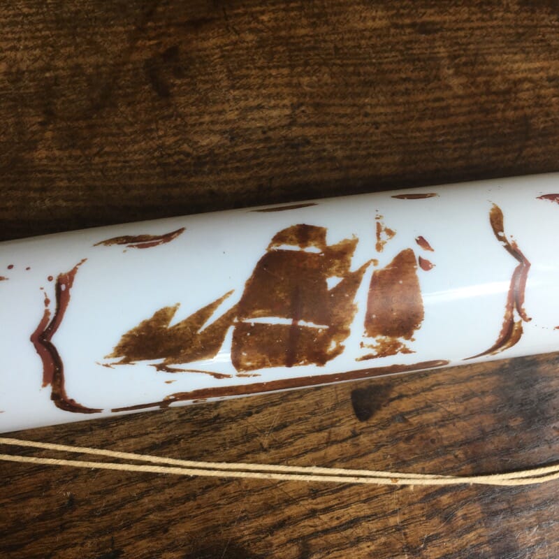 Victorian milk glass rolling pin, worn decoration of a ship, c.1860-24363