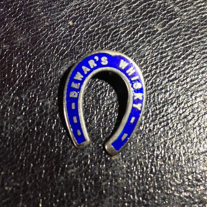 Sterling silver fob charm, blue enamel, "Dewar's Wiskey" c. 1910-0