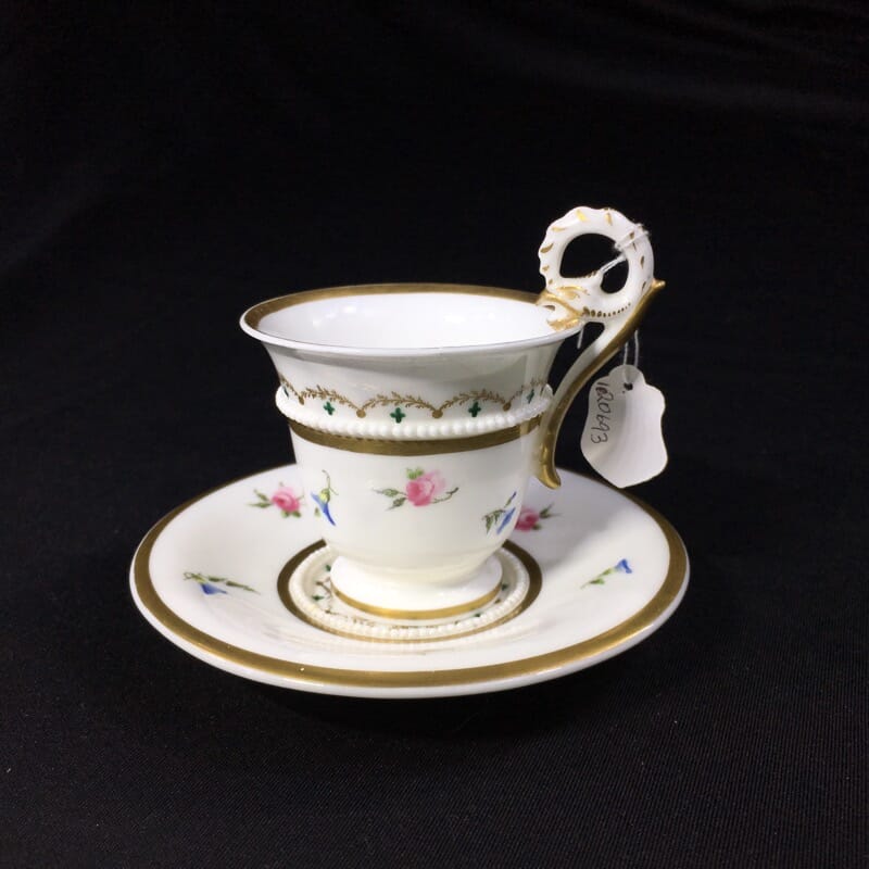 Nantgarw cup and saucer, serpent handle & flower sprigs, c. 1818-0