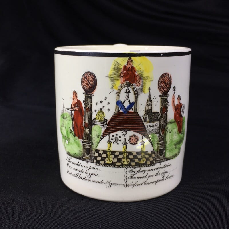 Creamware mug with Masonic print, 'The world is in pain...' c. 1780-0