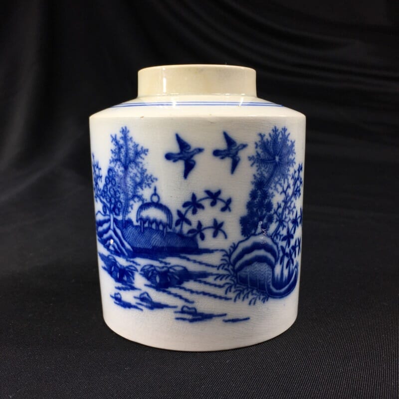 English Pearlware tea canister, river landscape print in blue, c. 1800-0