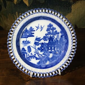 Spode basketweave rim plate, printed in blue 'Willow' pattern, c