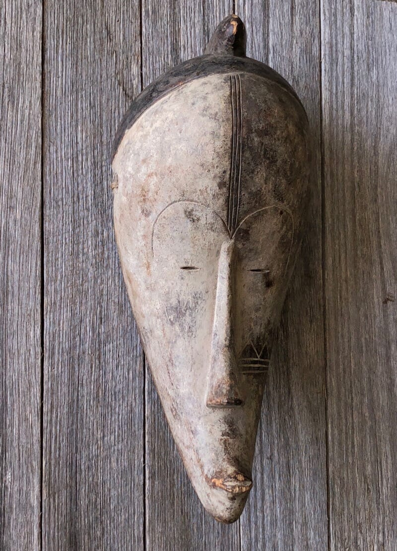 African mask, stylised face, Fang Ngil tribe, Gabon, 20th century. -0
