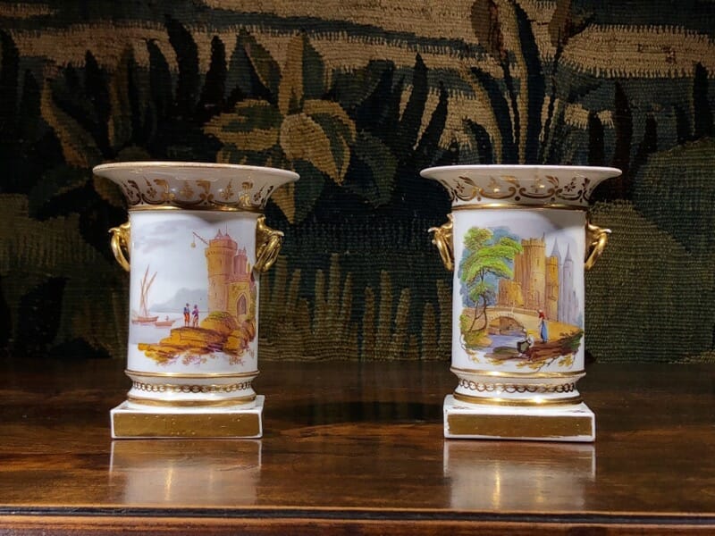 Pair of Rockingham porcelain spill vases with Continental scenes, c. 1835-0