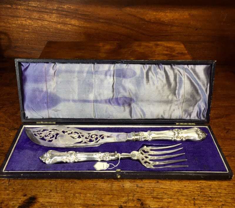 Pair of fish servers, finely pierced & engraved blades inc. dolphin, c. 1890-0