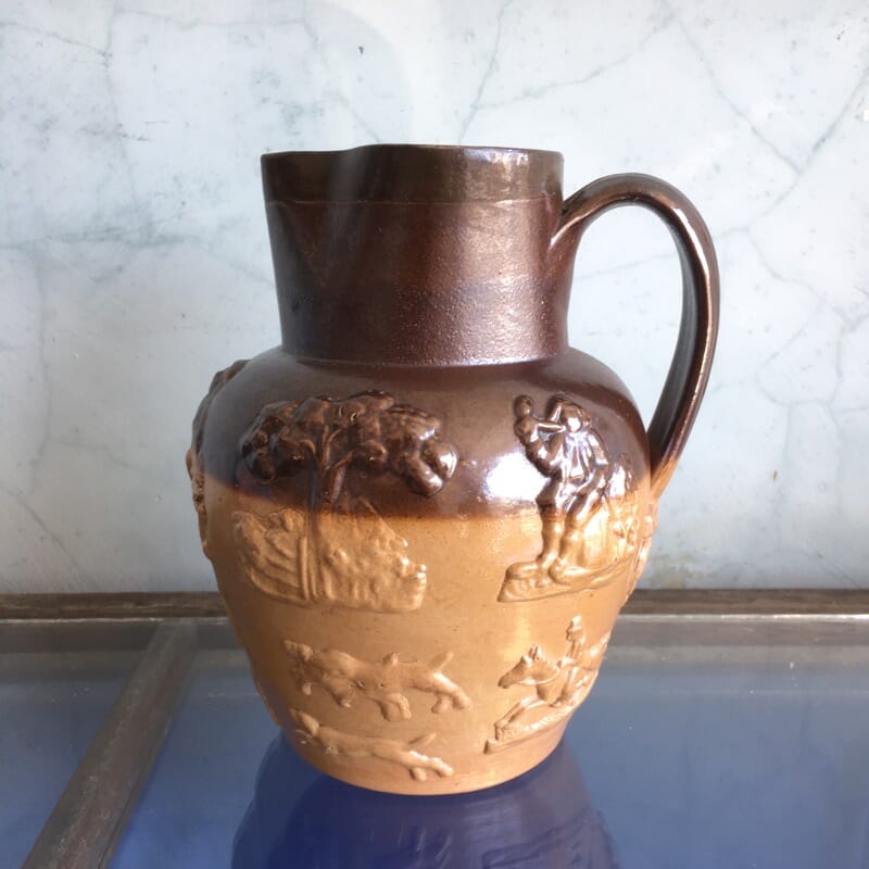English Saltglaze pottery jug, moulded hunting scenes, c. 1830-0