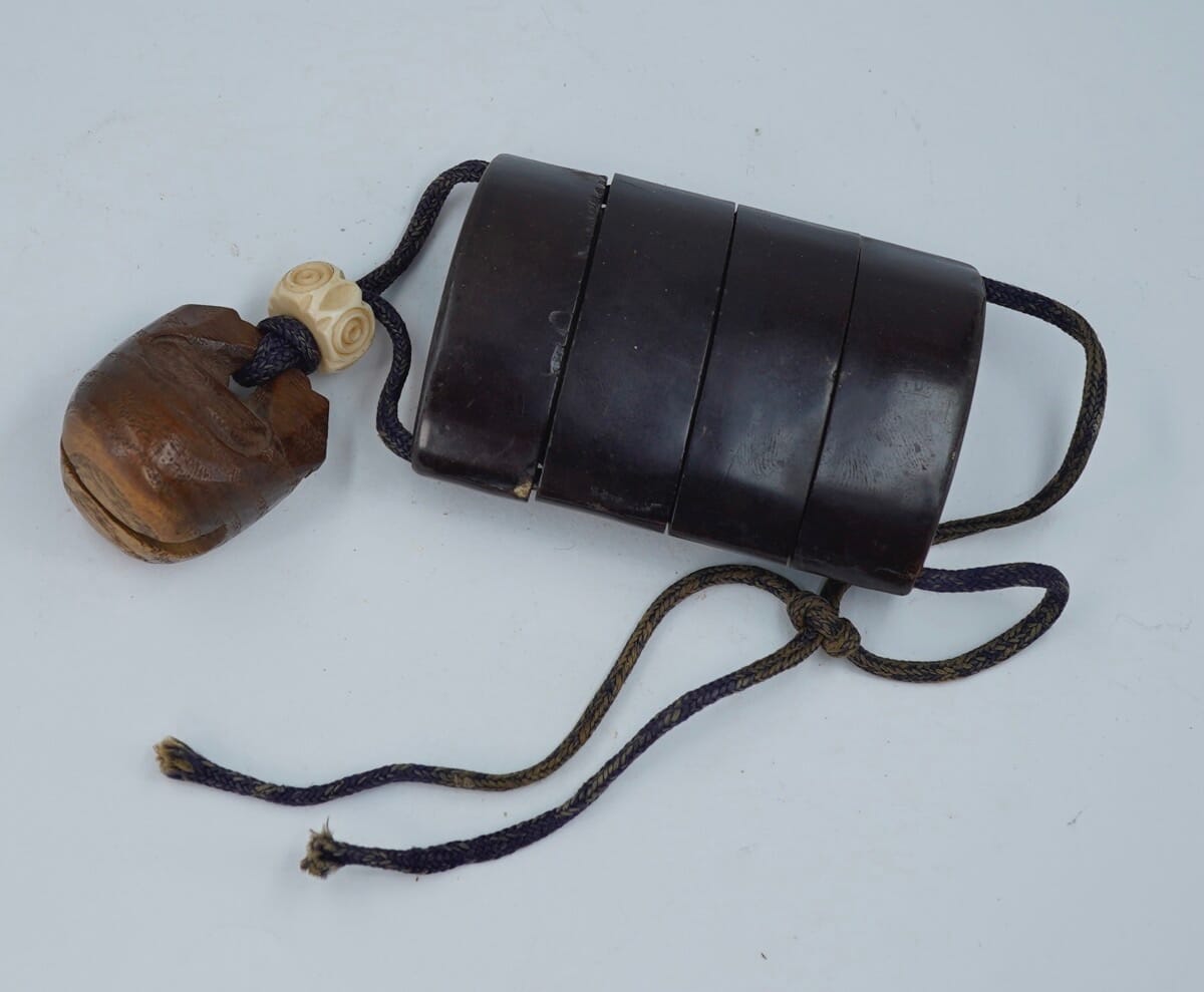 Japanese Inro, horn with wooden bell netsuke, 19th/20th century