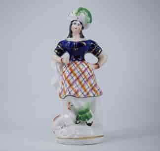 Staffordshire figure of a Scottish lady in a feathered hat, sheep at feet,c.1855