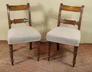 Pair of William IV mahogany chairs, sabre legs, c. 1835