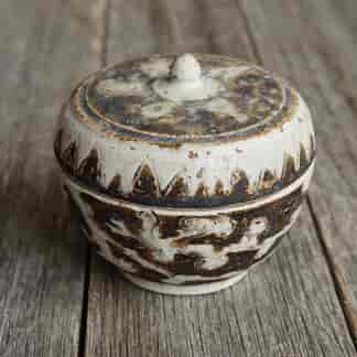 Thai Swankhalok stoneware box, lotus design in brown, 15th century