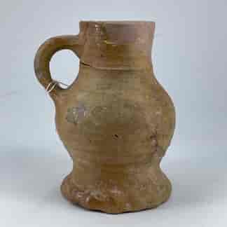 German stoneware drinking mug, thumbed base, Raeren 15th-early 16th century