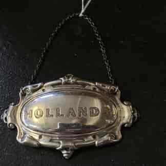 Silver decanter label, HOLLANDS , unmarked, 19th C.