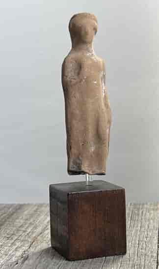 Greek terracotta figure of standing goddess, 5th century BC
