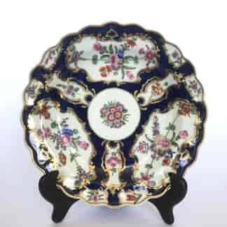 Dr Wall Worcester scale blue plate, lobed rim with flowers in panels, c. 1770