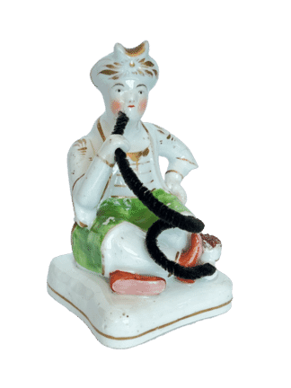 Staffordshire porcelain figure of a seated Turk, c.1835