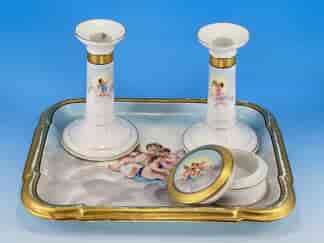 French Porcelain dressing table set, painted with cherubs, candlesticks & pot & tray, c. 1880