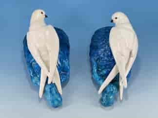 Pair of Moore Brothers wall pockets, white swallows perched on turquoise nests, c.1875