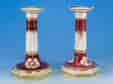 Pair of early Victorian porcelain candlesticks with claret ground, c.1845
