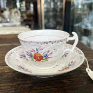 Davenport London shape cup and saucer with C-scroll moulding and purple lustre flowers, c.1830