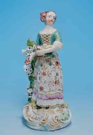 Derby figure of a girl with a basket, c. 1785