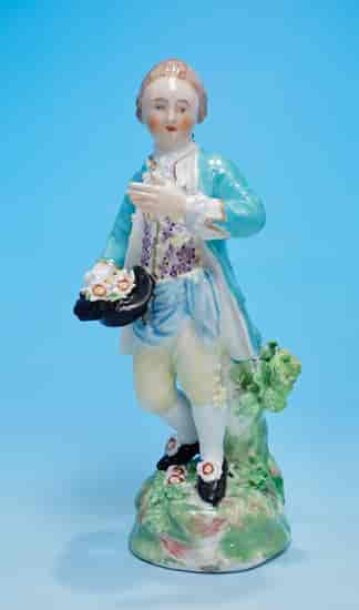 Derby figure of a boy with flowers, unrecorded model, No. 35?, circa 1780
