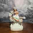 Staffordshire figure of the young Princess Royal (Victoria) riding a goat, C.1865