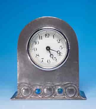 Small 'Tudric' pewter Liberty & Co clock, Knox design with enamel bosses, c. 1905