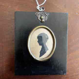 Silhouette of a child, signed Oabley , c.1900