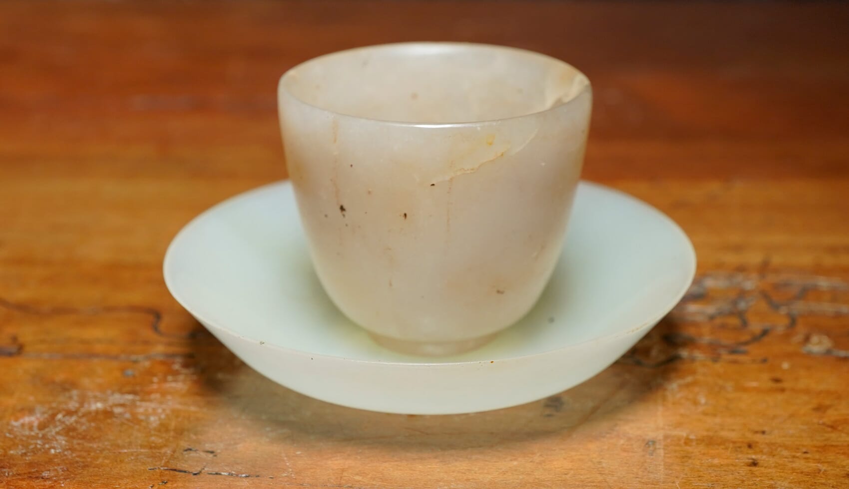 Chinese Jade miniature tea bowl and saucer, 19th/20th c.
