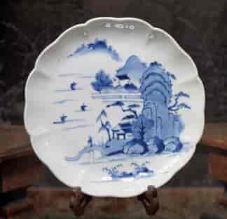 Japanese blue & white landscape plate, flower form, c.1700