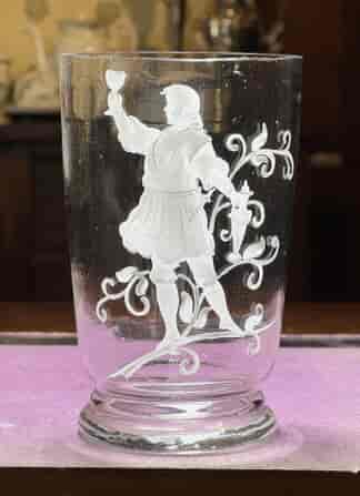 Continental glass beaker, white enamel dec. of a man with goblet, c.1860