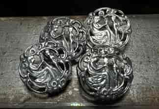 Four silver late Victorian openwork buttons, Venus & Cupid, c. 1900
