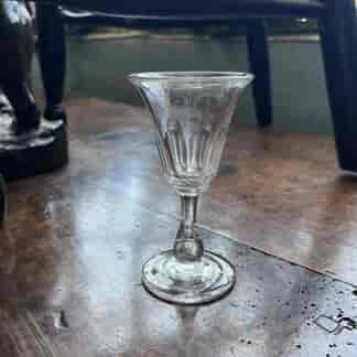 Early Victorian glass, with facet cut bell shape bowl on baluster stem with rough pontil, C.1850