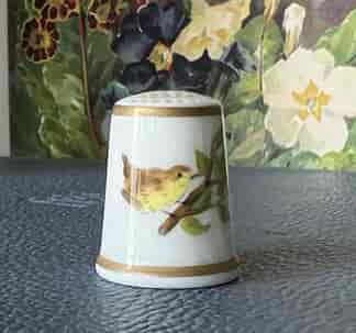 Royal Worcester thimble, hand-painted with a yellow bird, signed M. Lightherd