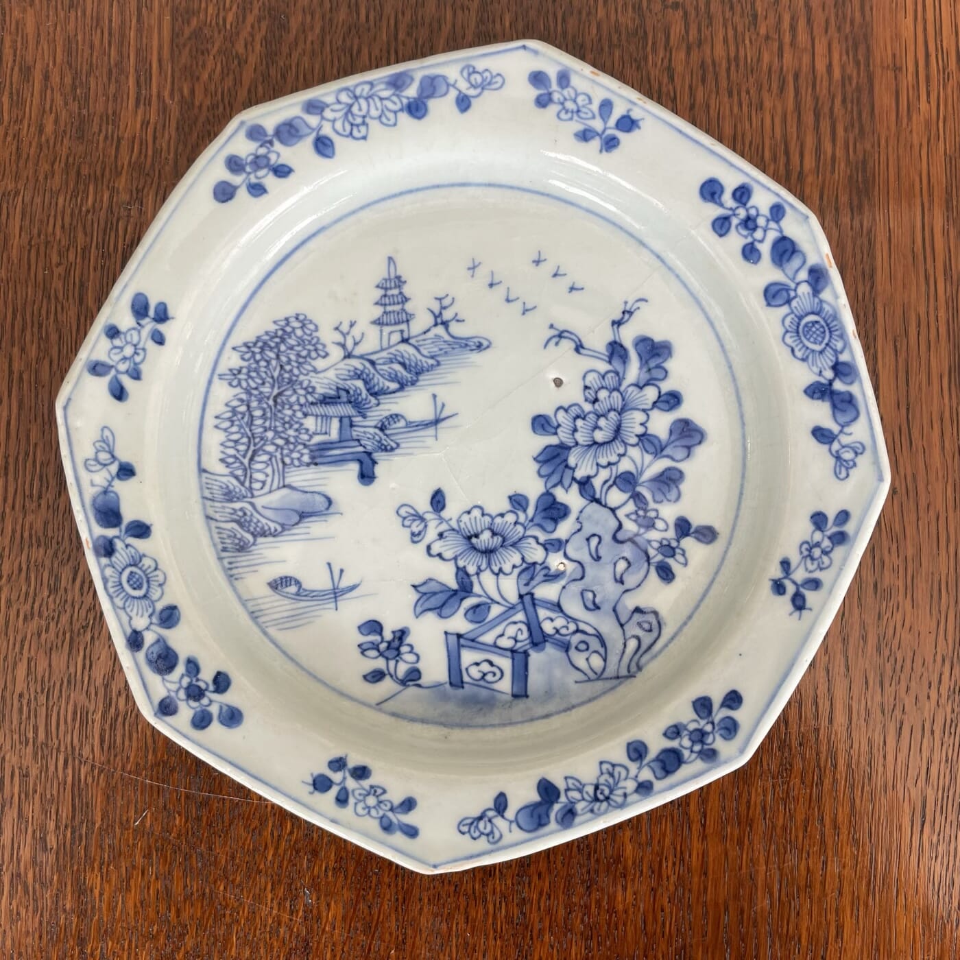 Chinese octagonal blue & white plate, river landscape, c. 1750