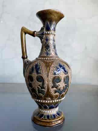 Doulton Lambeth ewer with intricate incised and beaded decoration, dated 1882