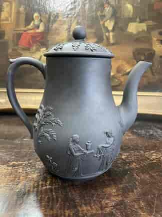 Wedgwood basalt coffee pot with classical relief,   1920