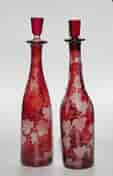 Pair of Ruby Flash engraved decanters, C.1875