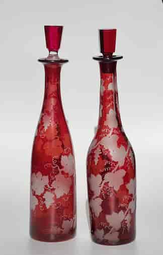 Pair of Ruby Flash engraved decanters, C.1875