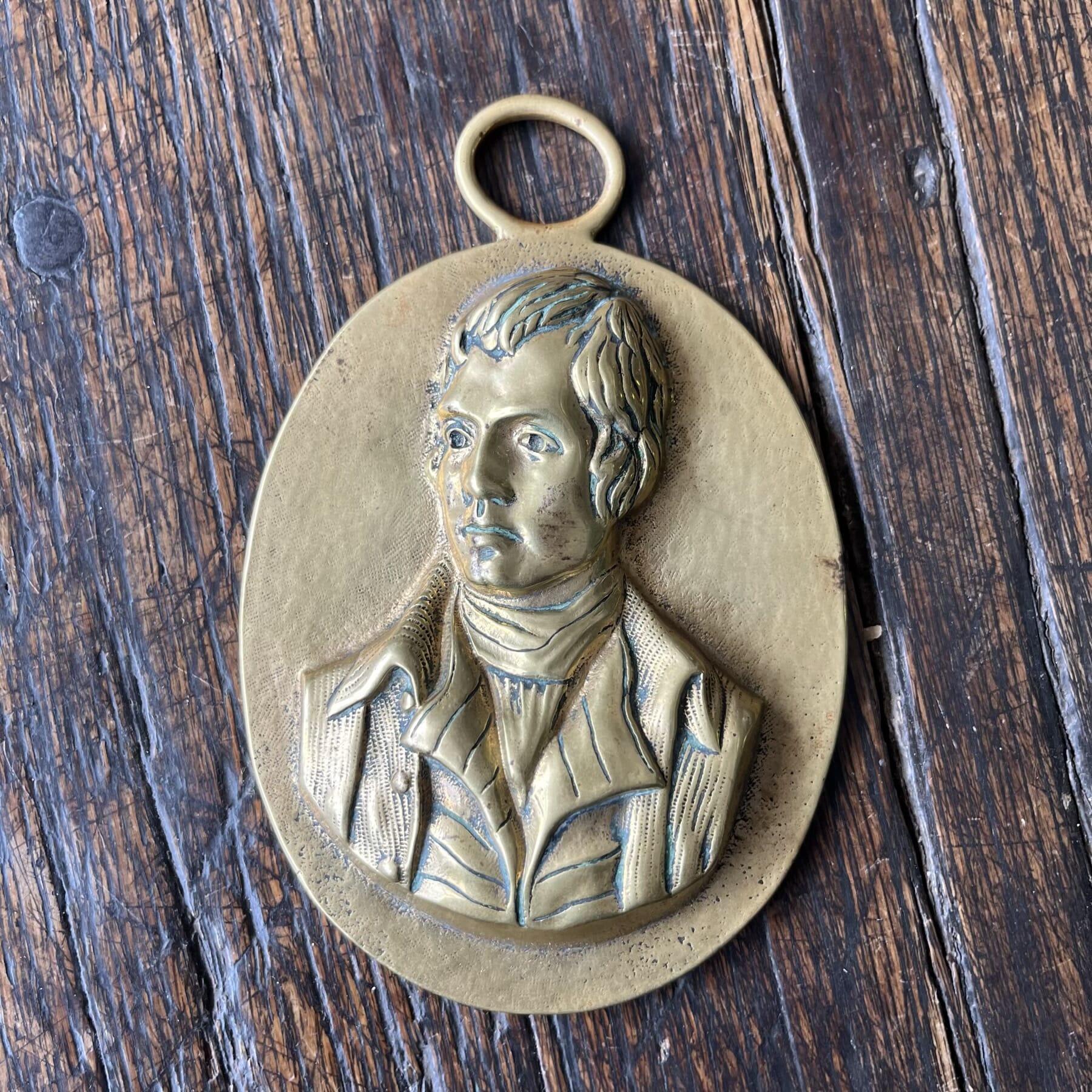19th century brass portrait of Robbie Burns